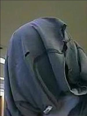 The Seattle Safe Streets Task Force is seeking information about a serial bank robber nicknamed the 'Elephant Man Bandit' for the material he wears over his head