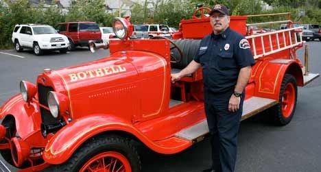 Bothell Fire Department Lt. Randy Parkhurst displays the city’s 1929 Ford Model A fire truck.