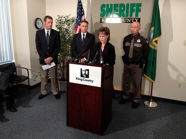 King County Councilwoman Kathy Lambert adresses the media during a press conference Friday. Behind Lambert is Sheriff Steve Strachan