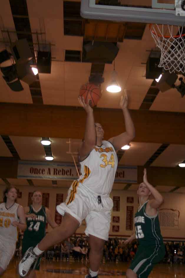 Inglemoor sophomore Deja Strother goes to the hoop during the team's KingCo tournament final victory.