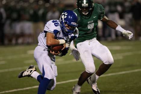 Bothell's Brad Monson runs up field after catching a pass against Skyline last Friday night.