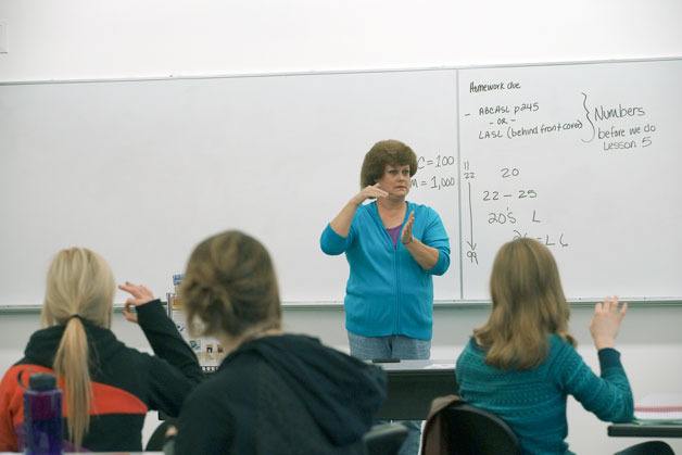 Jodene Anicello signs to her students in her ASL 121 course at Cascadia College on Oct. 30.