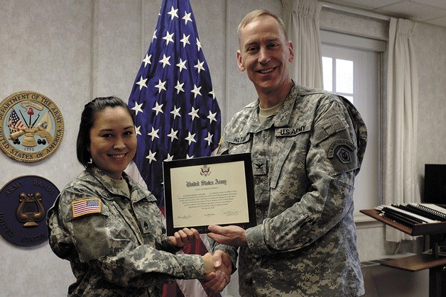 Army Staff Sgt. Kasumi K. Leonard has re-enlisted in the U.S. Army. She is the granddaughter of Robert Leonard of Bothell.