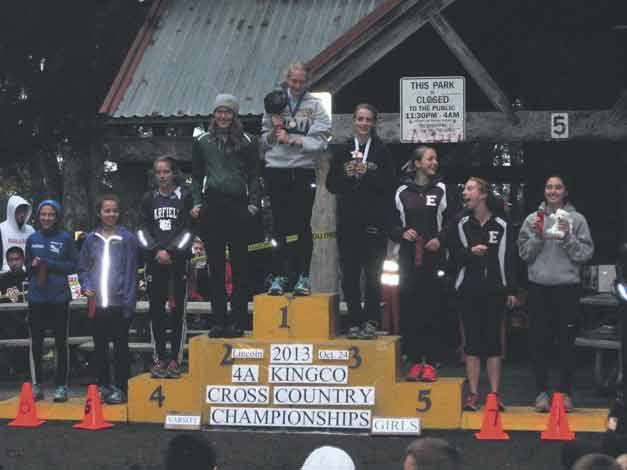 Inglemoor's Amber Rose stands atop the medal podium Thursday after becoming the first individual champion in school history. Bothell's Stephenie Spencer