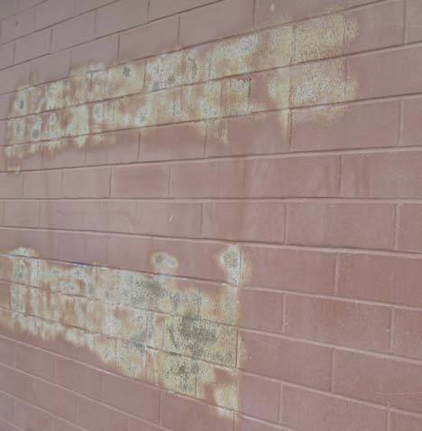 Pictured is a section of wall that was sandblasted to remove graffiti at Inglemoor High. It was to be painted by school-district maintenance personnel.