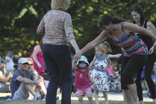 Families got their groove on during the Kenmore Summer Concert Series at St. Edward State Park on Thursday.