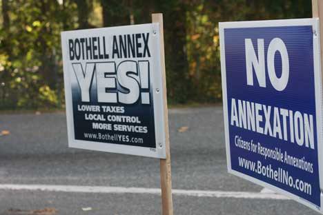 Many signs like these dominate streets in the North