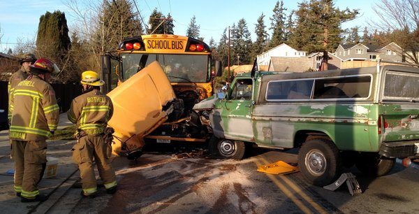 A school bus collided with a pickup truck early this morning.