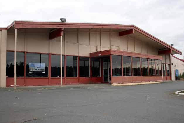 This building will have its facade renovated and house Kenmore Camera. The business will become the anchor for the redevelopment of Kenmore Village.