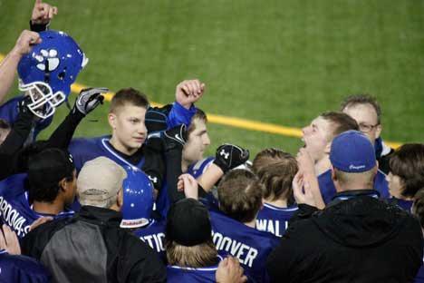 Bothell Cougars celebrate winning the Greater Eastside Junior Football Association title on Saturday.