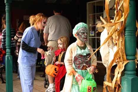 Kids trick or treat at Country Village last Halloween.