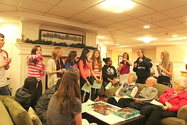 Canyon Park Junior High School ninth-grade English students visited Vineyard Park Assisted Living Home in Bothell for their third annual 'Script a Sonnet for a Senior' holiday event.