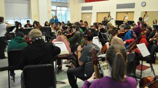 Inglemoor High's orchestra rehearses.