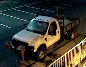 Stolen truck caught on video exiting Bothell Public Works Operations Center at 2:34 a.m. Sunday morning.