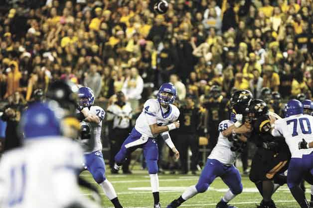 Bothell quarterback Ross Bowers throws the ball downfield to receiver Dayzell Wilson during the game against Inglemoor on Friday.