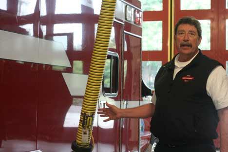 Northshore Fire Department Chief Tom Weathers tours the new Kenmore station.