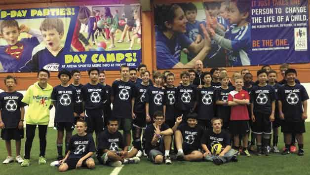 Boys from the U14 Northshore Select Fusion soccer team and Special Olympians gather at Redmond Arena Sports for their annual Gio Classic Fundraiser.