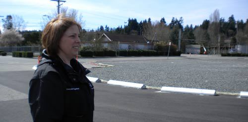 City of Bothell Assistant City Manager and Economic Development Manager Terrie Battuello surveys the scene this afternoon near the 5.9-acre West Bothell Landing Parcel