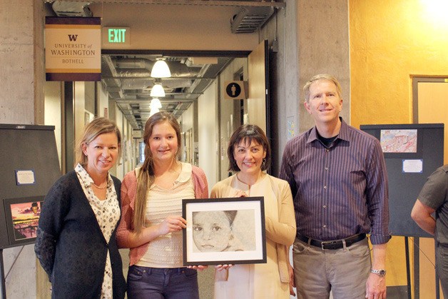 Congresswoman Suzan DelBene stands with the winners of the 2013 Congressional Art Competition for the 1st Congressional District during last year's award ceremony.