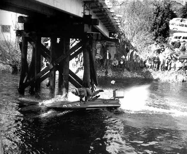 Ralph Payne's C-Stock hydro hits the railroad trestle near Blyth Park during the Sammamish Slough Race in the early 1960s.