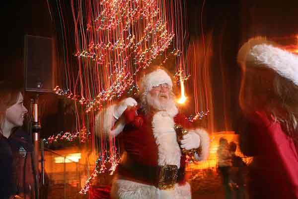 Santa Sean Shane-Kumler arrives at last year's tree-lighting ceremony at the Kenmore Community Center.