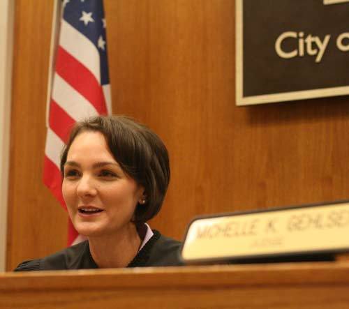 Bothell Judge Michelle Gehlsen speaks with a city staff member last week on a day off from court.