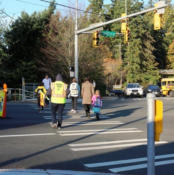 Kids cross the street to get to school for the first week of classes. Contributed photo