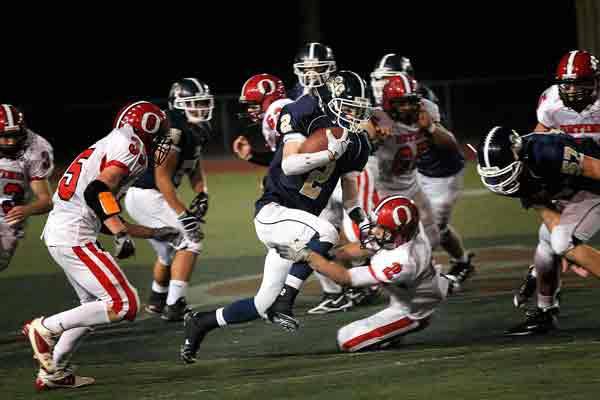 Cedar Park Christian senior Ben Fuchs blazes past the Orting defense during last Friday night’s matchup.