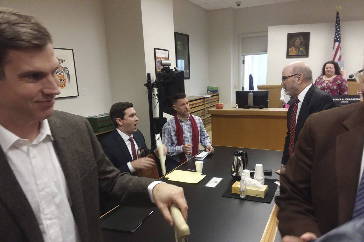 Judge Veronica Alicea-Galván’s courtroom just after hearing arguments on the I-27 lawsuit. From left to right: Mark Cooke, State Rep. Drew Stokesbary, Joshua Freed, Jeff Slayton. Courtesy of Casey Jaywork